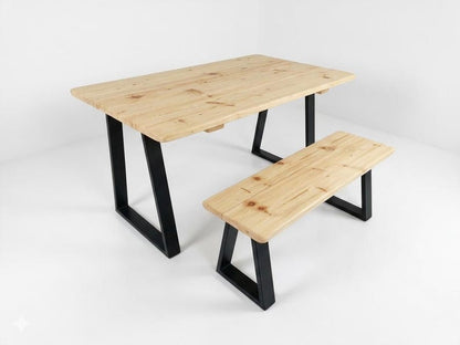 Dining table and matching bench with light natural wood tops on black metal frames