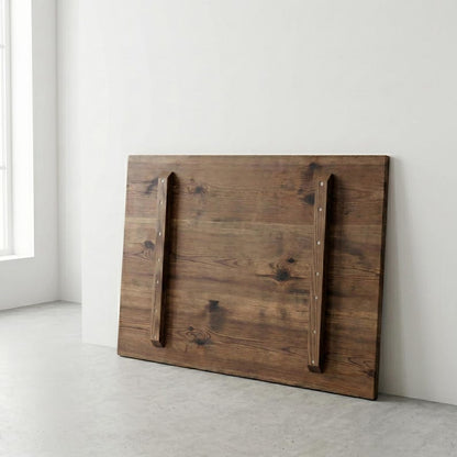 Medium brown wooden tabletop with two screwed-on support battens