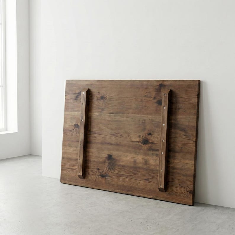 Medium brown wooden tabletop with two screwed-on support battens