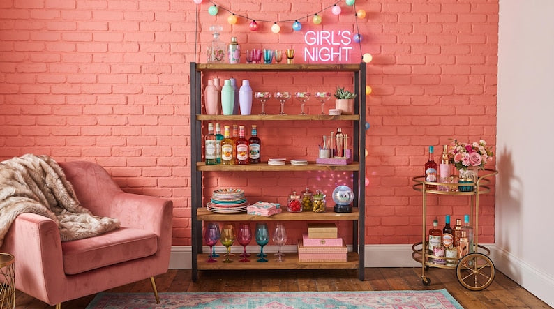 Five-tier wooden shelving unit with a dark metal frame holding glassware and bottles