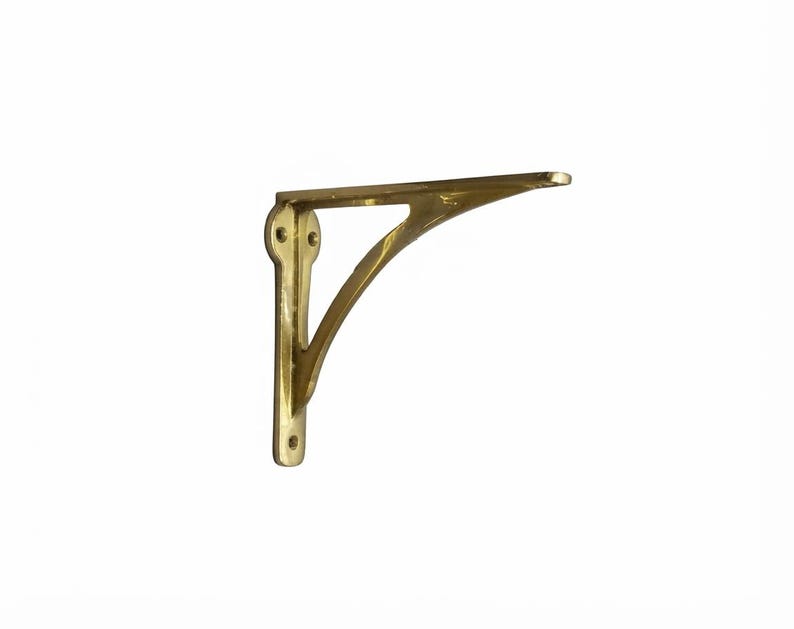 L-shaped polished brass shelf bracket with curved support brace